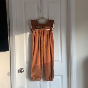 Zara Child Romper, size 4-5 years. Brown, white, cream, blue and red detailing.